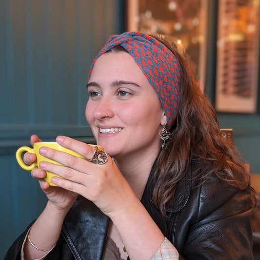 Merino wool ear warmer knitted headband dots and spots design in orange and blue