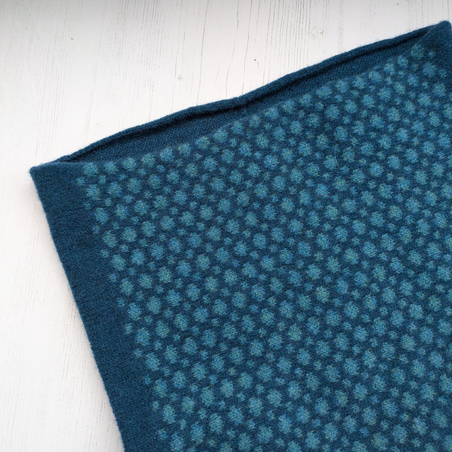 Lambswool knitted Fair Isle cowl in dots and spots design - two tone blue