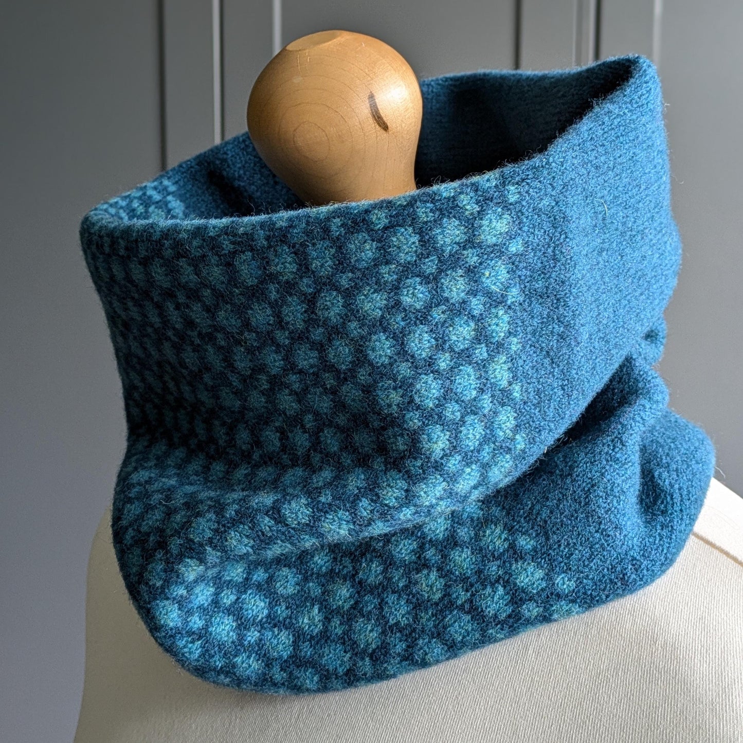 Lambswool knitted Fair Isle cowl in dots and spots design - two tone blue