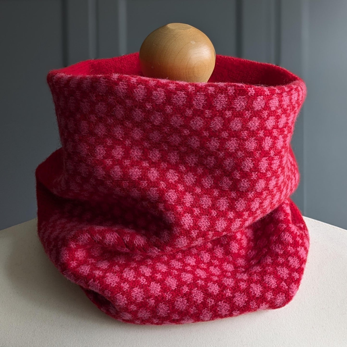 Lambswool knitted Fair Isle cowl in dots and spots design - red with pink spots