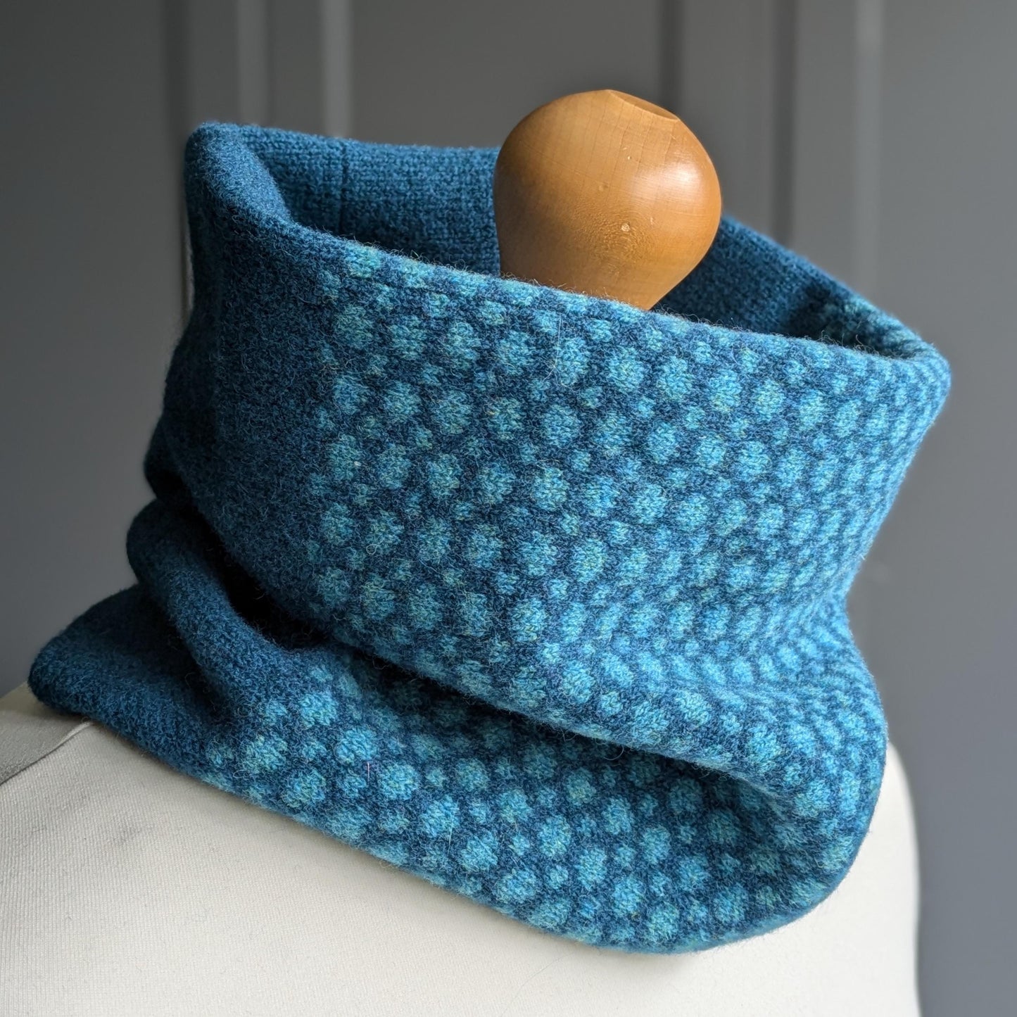 Lambswool knitted Fair Isle cowl in dots and spots design - two tone blue