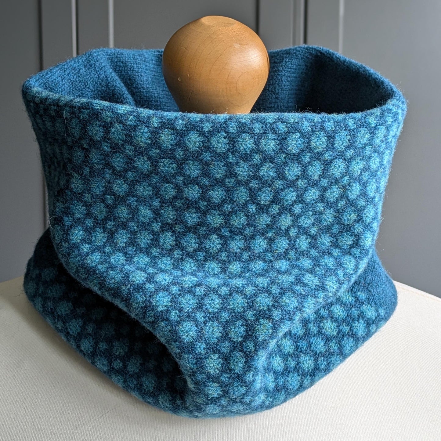 Lambswool knitted Fair Isle cowl in dots and spots design - two tone blue