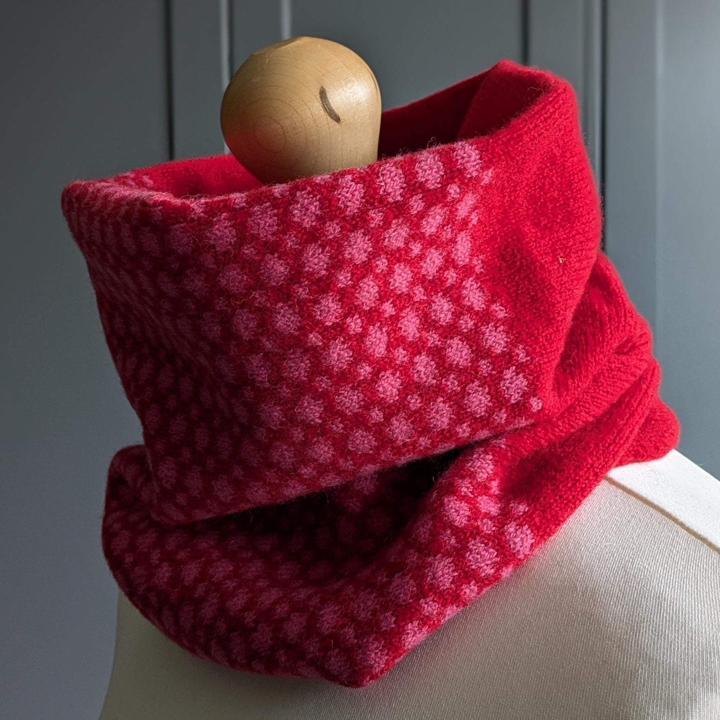 Lambswool knitted Fair Isle cowl in dots and spots design - red with pink spots