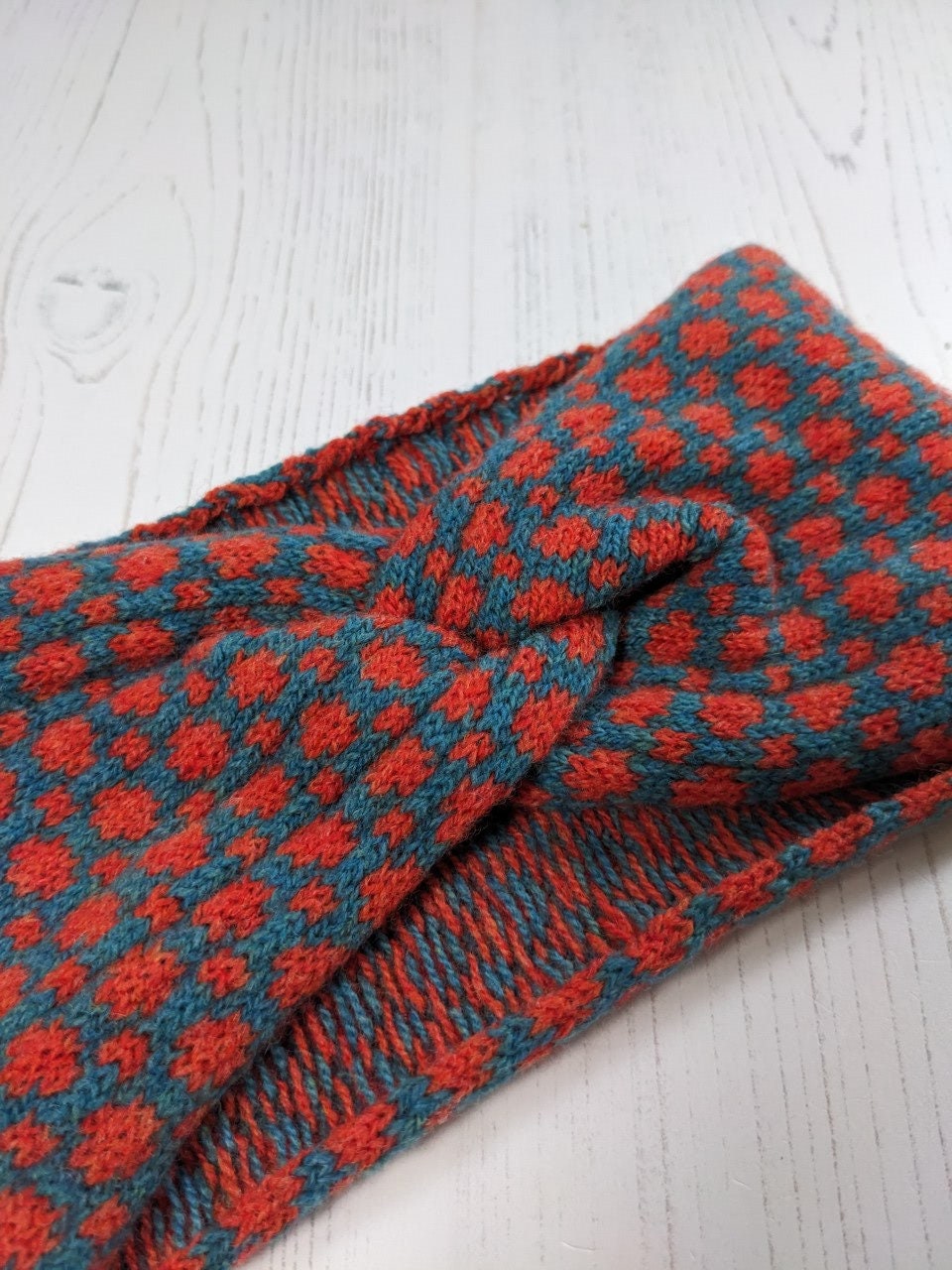 Merino wool ear warmer knitted headband dots and spots design in orange and blue