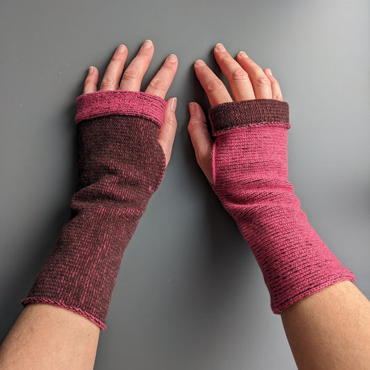 Knitted lambswool reversible wrist warmers in pink and brown