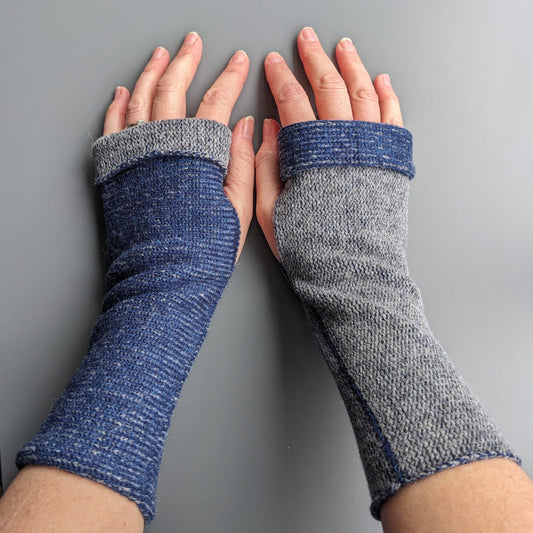 Knitted lambswool reversible wrist warmers in navy blue and grey