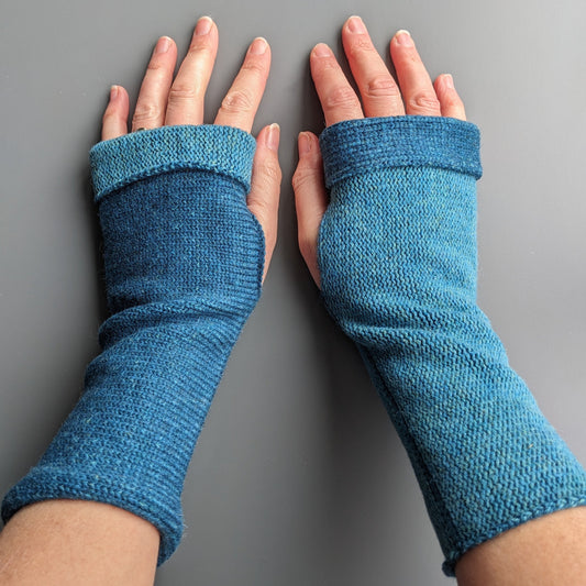 Knitted lambswool reversible wrist warmers in two tone blue